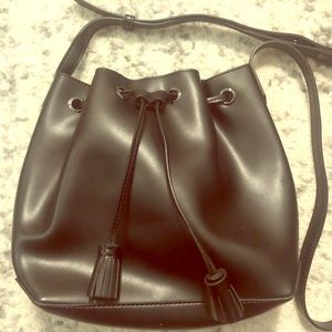Never been used Black faux leather bucket bag